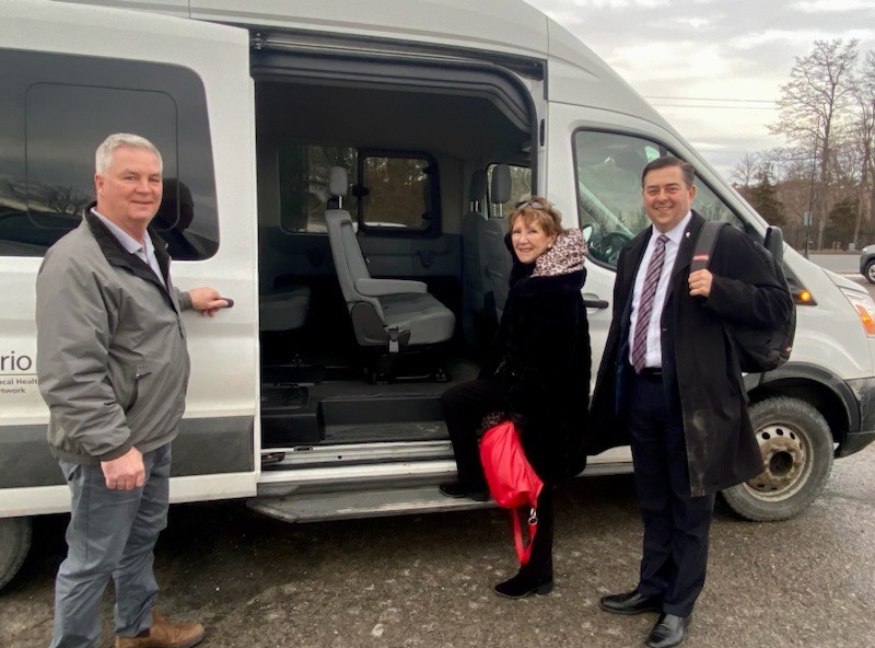 Warden Mandy Martin and Deputy Warden Brian Ostrander board the Commuter Connect bus in Colborne, welcomed by driver Mike Gibson.